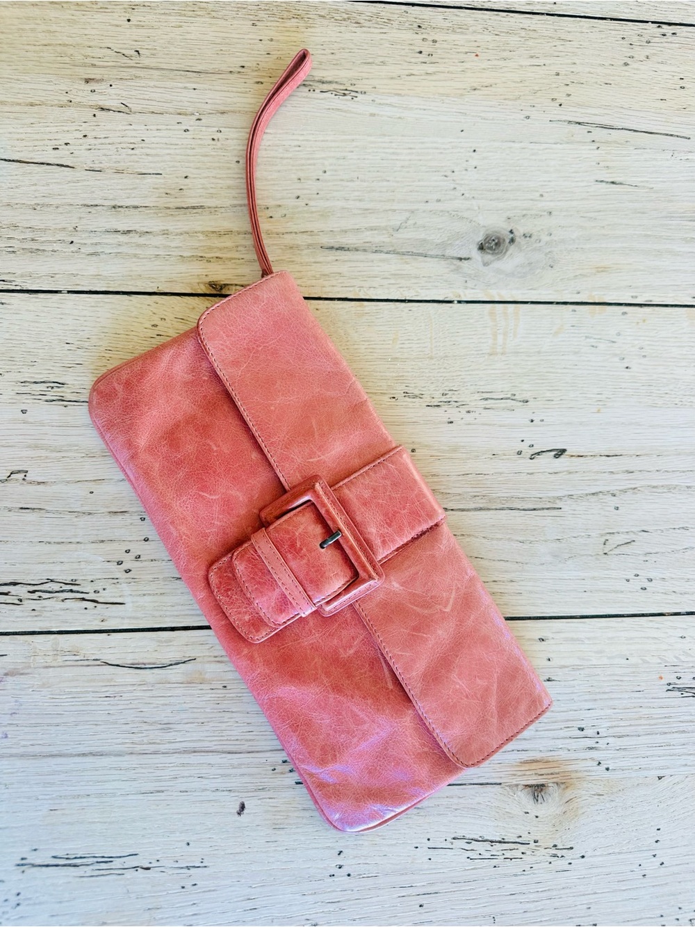 HOBO Coral Buckle Wristlet Clutch in Soft Pink